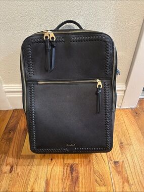 Calpak Black Backpack with Gold Hardware and Whipstitch Detail